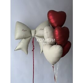 Композиция из шаров для девушки с бантом